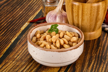 Baked white canned beans in the bowl