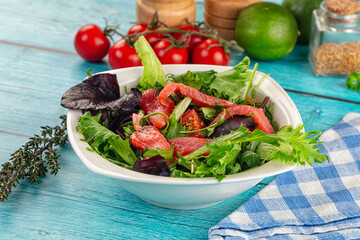 Salad with salmon and arugula