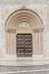 Fototapeta premium Santa Maria di Collemaggio church side entrance, L'Aquila, Italy