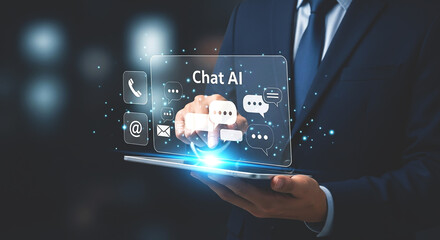 Man in suit interacting with chat ai interface on tablet with glowing icons and communication bubbles