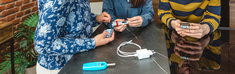 Unrecognizable mother, daughter and son checking 72 hours survival emergency kit supplies with...