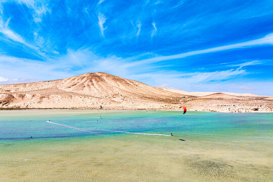 Kite surfing at idyllic Sotavento beach, Fuerteventura