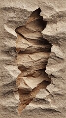 Vertical crack in a textured stone surface