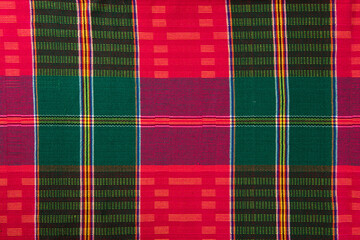 Traditional Colorful hand-woven fabrics texture background.