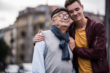 Affectionate family moment outdoors in city showing happiness and joy