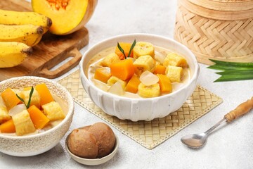 Kolak Pisang is an Indonesian dessert made from bananas, pumpkin cooked with coconut milk, palm sugar and pandan leaves.