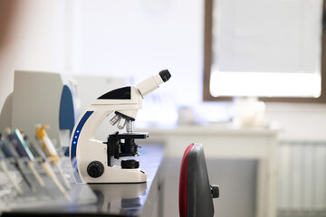 Laboratory microscope on table in medical research facility
