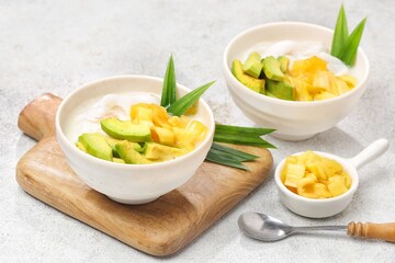 Es teler is an Indonesian fruit cocktail. Avocado, coconut meat, grass jelly, jackfruit and other fruits are served with coconut milk, sweetened condensed milk, and sugar