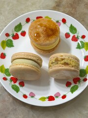 Colorful macarons with a delicate, crispy shell and soft, flavorful filling. Perfect for dessert photography, showcasing these elegant French treats in a variety of flavors and vibrant pastel colors.