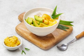 Es teler is an Indonesian fruit cocktail. Avocado, coconut meat, grass jelly, jackfruit and other fruits are served with coconut milk, sweetened condensed milk, and sugar