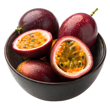 Close-up shot of a dark bowl filled with passion fruit, some halved.