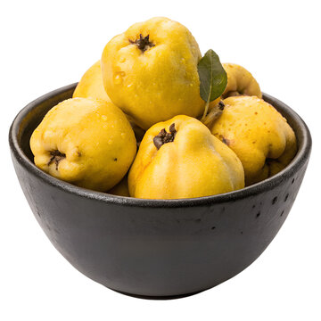 A dark ceramic bowl filled with fresh, ripe yellow quince fruits isolated on a white background.