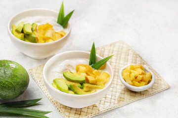 Es teler is an Indonesian fruit cocktail. Avocado, coconut meat, grass jelly, jackfruit and other fruits are served with coconut milk, sweetened condensed milk, and sugar