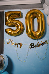 Vertical photo of the photo zone design in blue tones during the 50th anniversary celebration