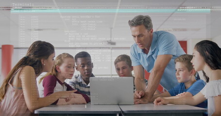 Guiding male instructor leaning over table instructing students at lab, with laptop code overlay
