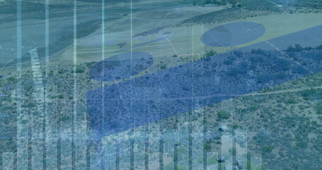 Displaying arid scrubland with data bars, yellow flight paths and blue landing pads over desert