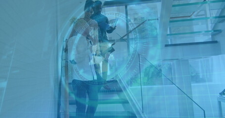 Descending trio business professionals using glass office stairs, displaying digital data overlay