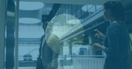 Floating translucent coin graphic displaying NFT Crypto Currency Non-Fungible Token in atrium