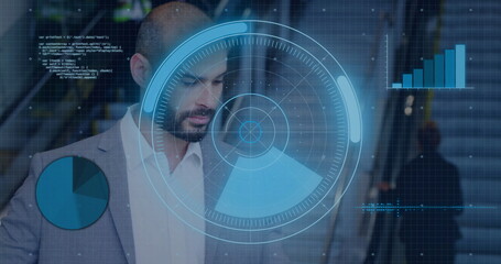 Analyzing adult male professional standing at office lobby escalator bank, with radar HUD overlays
