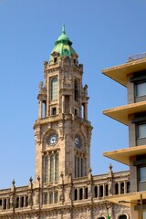 The contrast between Porto City Hall , Neoclassical 1900s building and modern building