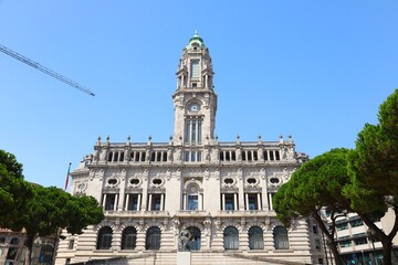 Fototapeta premium Porto City Hall ( Camara Municipal do Porto ). Neoclassical 1900s building featuring a black-marble entrance hall & a clocktower with city views.