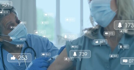 Nurse aligning syringe needle then injecting vaccine into arm while social media icons rising - Powered by Adobe