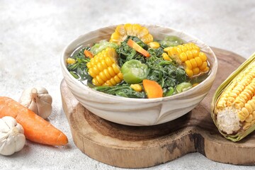 Sayur bayam bening or spinach clear soup in bowl
