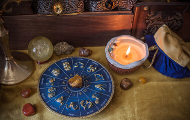 Enchanted ritual altar with burning candle, mystical hand, and ancient grimoire on golden cloth