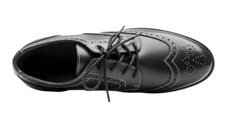 A black leather oxford wingtip brogue shoe with laces, viewed from the top, isolated on transparent background