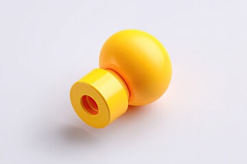 Bright yellow, round, geometric object on a plain background