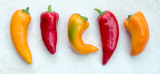 Display of Red and Orange Peppers