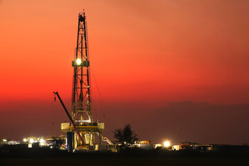Oil drilling rig at twilight 