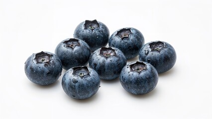 Group of eight wet blueberries resting on a plain white background