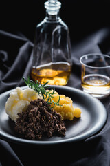 Traditional Scottish meal of Haggis Neeps and Tatties ( haggis, swede and mashed potato) Usually served for Burns night supper with a glass of whisky.