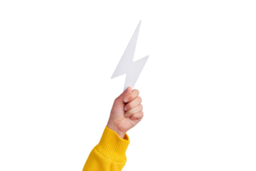 hand holding white lightning bolt cutout on white background.