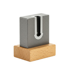 Fototapeta premium Ultra photorealistic industrial steel-rule die with a sharp blade on a laser-cut wooden base, centered on a transparent studio background with shadowless diffused lighting, concept of industrial