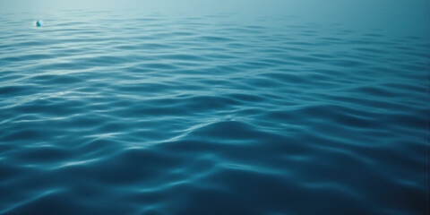 Crystal Clear Water Ripples Gentle water ripples create soft, subtle reflections in a serene blue background. The calm and soothing