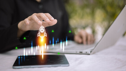 Startup business growth and innovation with rocket launch icon