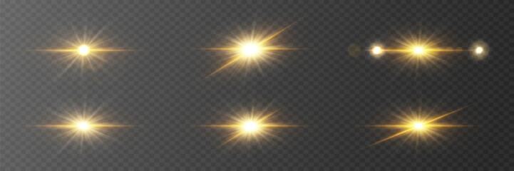 Collection of light flares and golden stars. On a transparent background.
