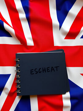 Against the background of the flag of Great Britain lies a notebook with the inscription - ESCHEAT
