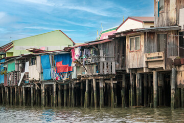 Wooden houses along the Khlong Mong canal on the Thonburi side of Bangkok, Thailand