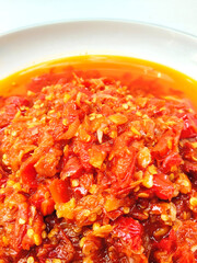 A Vibrant and Appetizing Bowl of Chili Sauce
