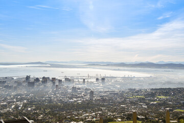 Fototapeta premium View of Cape Town in the morning mist from the foot of Table Mountain