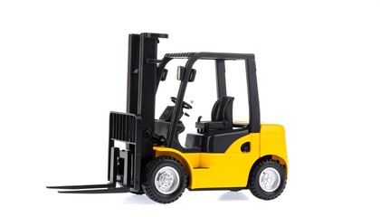 A vibrant yellow forklift truck standing on a pristine white background in studio shot