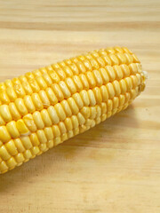 Fresh Yellow Corn on a Rustic Wood Background