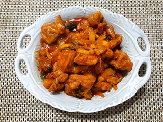 Korean Style Spicy Stir-Fried Chicken (Dak Galbi) on White Plate