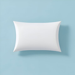 Empty white pillow-shaped packaging design against a light blue background. Product mockup with a clean, modern aesthetic.
