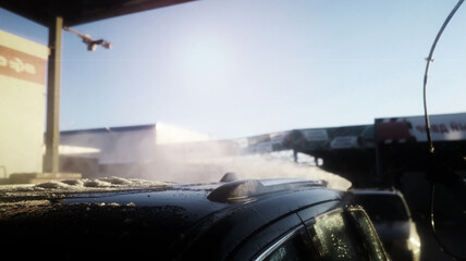 Outdoor high pressure washing for cars. Self-service express car wash.