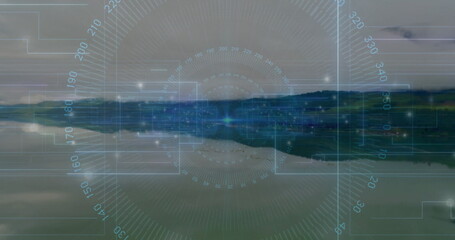 Overlaying circular compass interface at lakeshore, with grids, markings, boxes and data points
