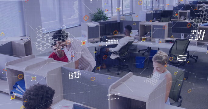 Collaborating staff leaning over cubicles, pointing at monitors in office, with digital overlay
